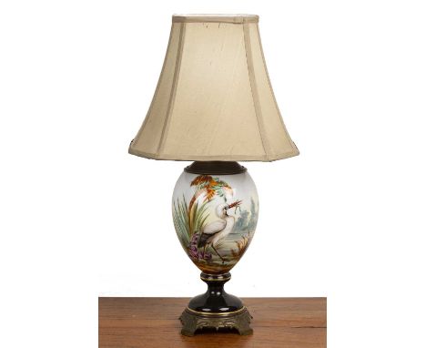 Porcelain table lamp and shadeFrench, late 19th Century, painted with a heron and toad, 61cm highSome slight marks.