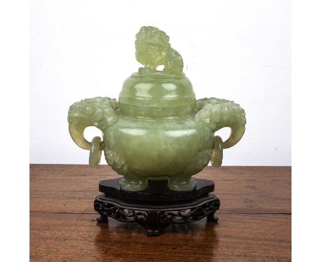 Green hardstone vase and coverChinese, with carved elephant ring handles and a dog of fo finial, 16cm wide x 16cm highThis lo