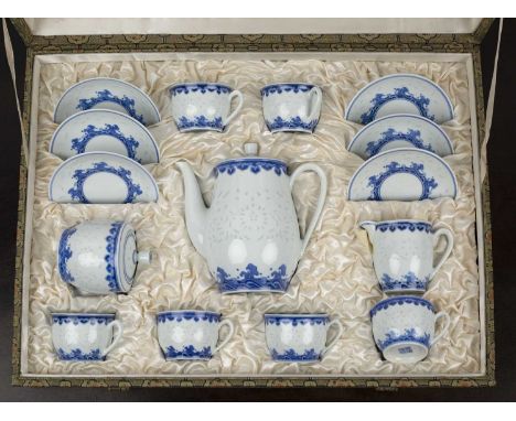 Blue and white rice pattern contemporary coffee setChinese, comprising six coffee cups and saucers, a coffee pot, sugar jug a