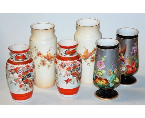A pair of early 20th century Crown Ducal ware vases, of tapered cylindrical form, decorated with birds amongst branches, prin