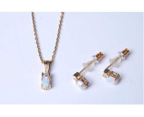 An opal and white hardstone pendant, indistinctly stamped '18' on a chain stamped 585, together with a pair of matching earri