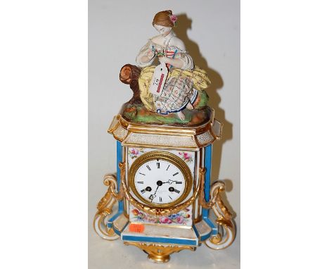 A late 19th century French porcelain cased mantel clock, having enamelled dial with Roman and Arabic numerals, eight day move