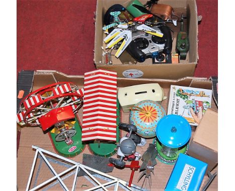 Two boxes of mixed effects, to include; model ferris wheel, telegraph pole, remote controllers etc 