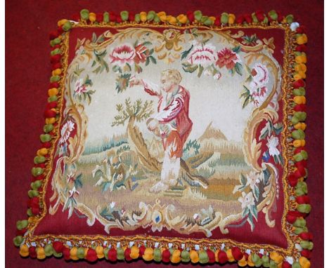 A 19th century tapestry panel, later adapted to a cushion