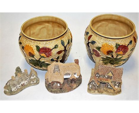 A pair of H J Wood Indian Tree pattern jardinieres; together with seven David Winter loose model cottages