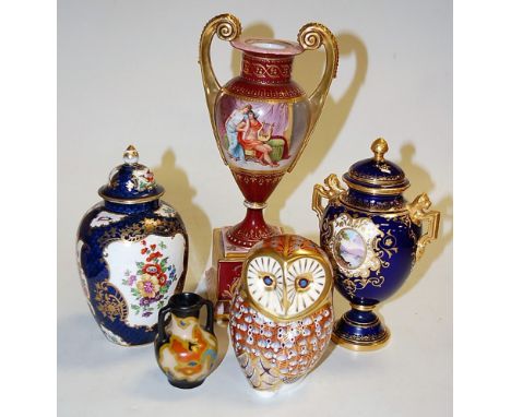 A Coalport porcelain pedestal vase and cover (restored to base), h.17cm; together with a small Gouda pottery vase; a Royal Cr