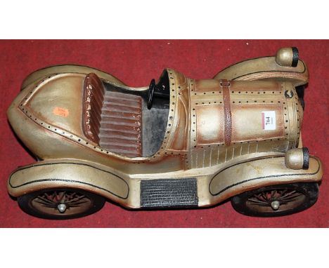 A painted wood model vintage car 