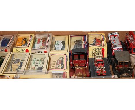 A box of various cased and loose Days Gone diecast model vehicles 