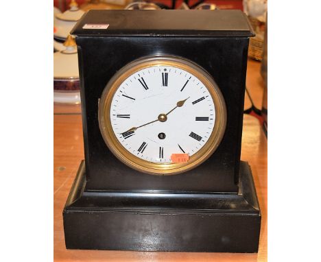 A late Victorian black slate mantel clock having enamelled dial with Roman numerals and French cylinder movement, height 31cm