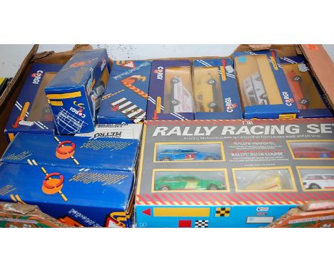 A box of Corgi model vehicles, to include a Rally Racing set