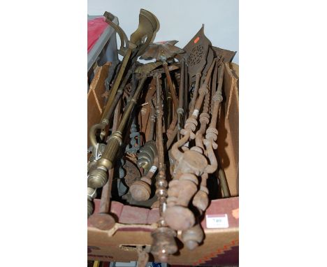 A mixed collection of 19th century steel and brass fire tools