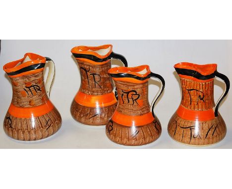 A set of four Myott & Son painted ceramic single handled jugs, each having pinched spouts and of tapering lower bulbous form,