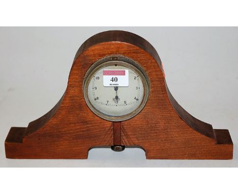 A mid-20th century beech cased Smiths mantel clock, having silvered dial with Arabic numerals