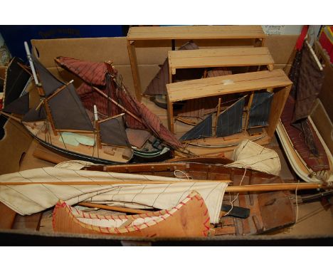 A box of scratch-built model sailing boats 