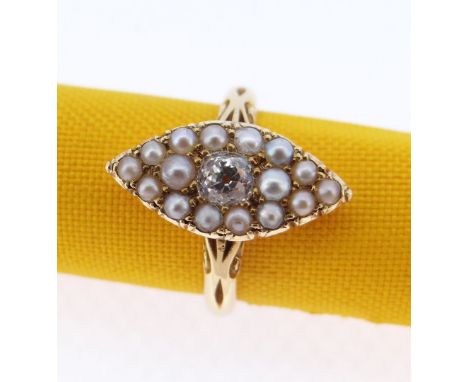 18CT GOLD MARQUISE DIAMOND &amp; PEARL RING, the central diamond (0.25cts approx.) surrounded by sixteen pearls, shank engrav