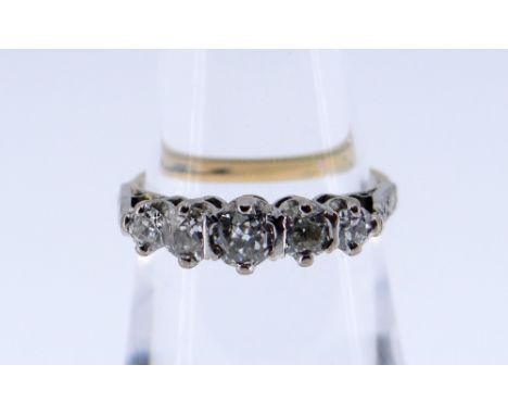 18CT GOLD FIVE STONE DIAMOND RING, the old European cut graduating stones totalling 0.4cts overall approximately, ring size K