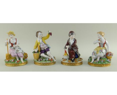 SET OF FOUR SITZENDORF PORCELAIN FIGURINES OF THE SEASONS, decorated in a Meissen-style with children on floral bases with va