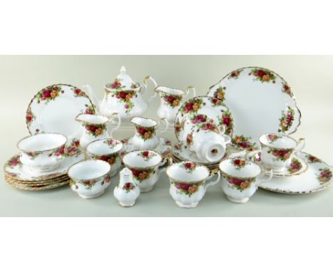 ROYAL ALBERT 'OLD COUNTRY ROSES' SIX-PLACE TEA SERVICE, comprising teapot, 3  milk jugs, 2 sugar bowls, 7 teacups, 2 bread an
