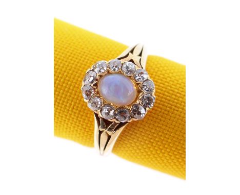 18CT GOLD OPAL &amp; DIAMOND CLUSTER RING, the central opal (5 x 4mms) surrounded by twelve diamonds, ring size M / N, 2.6gms