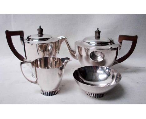 A mid 20th century silver four piece Tea Service, Art Deco style U shape with tapering crimped foot, wooden handle and knop, 