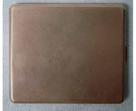 A 9ct gold Cigarette Case of typical rectangular form, engine turned surfaces, 142g, 9.7cm by 8.4cm 