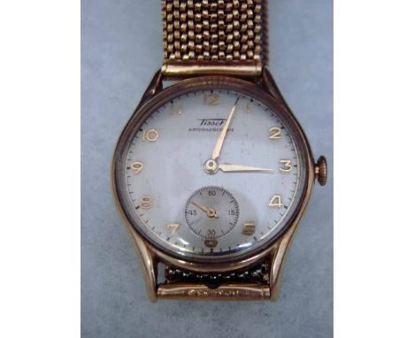 A Tissot 9ct gold cased manual wind Wrist Watch, the silvered 30mm dial with Arabic numerals, subsidiary seconds dial at 6, s