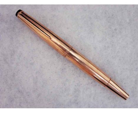 A Mont Blanc Meisterstuck Fountain Pen, gilt metal model 82, black and white star end caps 