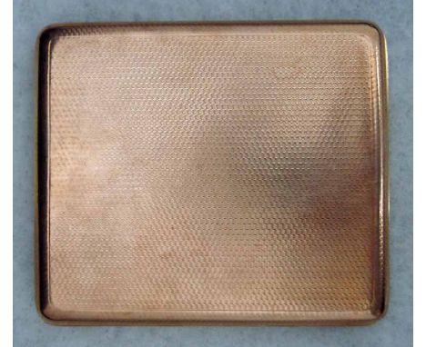 A 9ct gold Cigarette Case of rectangular form, engine turned surfaces, hallmark for 1927, 128.6g 9.5cm by 8.3cm   