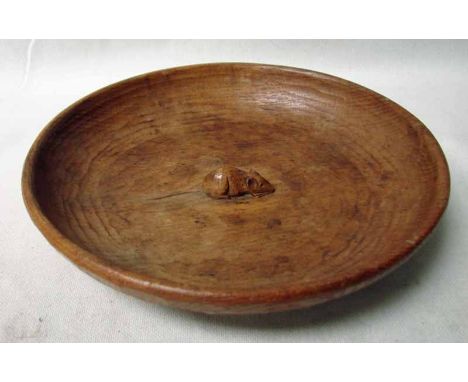 Robert 'Mouseman' Thompson of Kilburn, a circular oak fruit bowl, adzed finish, centrally with carved signature mouse, 28.5cm