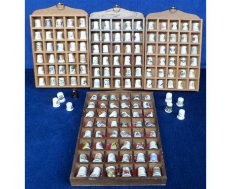 Thimbles, 140+ ceramic thimbles in wooden display cases, subjects include birds, Royalty, topographical, charity, Christmas e