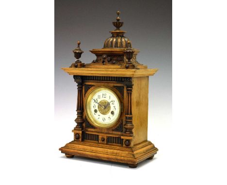 H.A.C. (Hamburg American Clock Co.) '14 Day Strike' German walnut cased mantel clock, having a cream Arabic dial, No. 31098, 