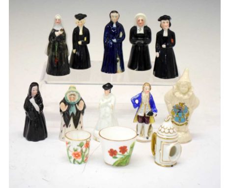 Collection of novelty ceramic candle snuffers, etc., 11cm high and smaller