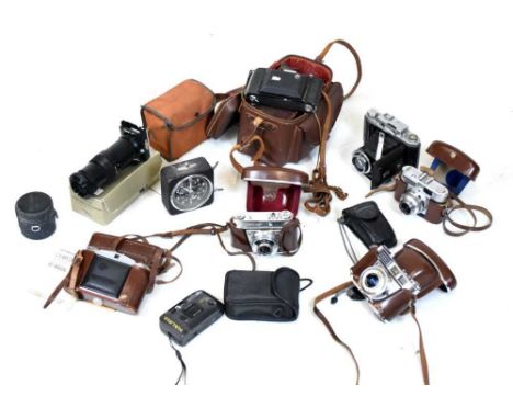 Assorted cameras and accessories to include Voigtlander Vito BL, Agfa Isolette II, Repromaster 1:9.25 lens, Soligor telephoto