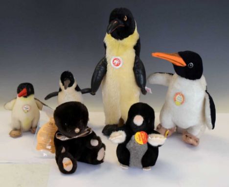 Four Steiff penguins (two limited editions, 2000),one boxed, tallest 32cm high, together with a Steiff mole, 16cm high and a 