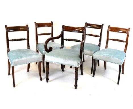 Set of four rope-twist back dining chairs on sabre supports together with an associated carver on ring turned supports (4+1)