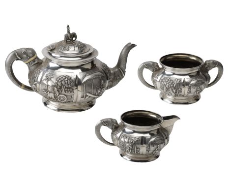 A late 19th century Indian silver three piece tea service, by Grish Chunder Dutt, Calcutta, of good gauge, decorated in high 