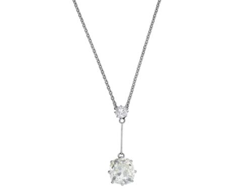 An early 20th century diamond pendant, the old brilliant-cut diamond suspending a knife-wire drop terminating in an old cushi