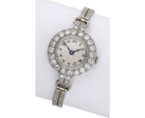 Vertex. A lady’s platinum and diamond-set cocktail watch, circa 1920. Movement: manual winding, 17 jewels. Dial: silvered, Ar