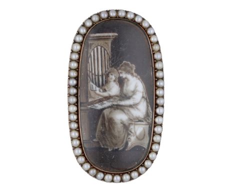 A late 18th / early 19th century brooch, of shaped oval form, the glazed panel painted en grisaille on ivory to depict a moth