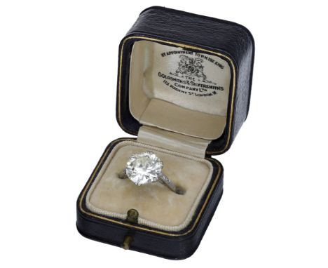 An early 20th century diamond single stone ring, set with an old brilliant-cut diamond, weighing 4.79 carats, within a galler