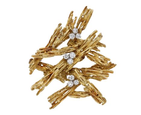 An 18ct gold and diamond brooch by Kutchinsky, 1971, of openwork abstract design, the overlapping textured batons set with tr