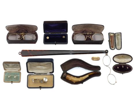 A small collection of dress accessories, to include a 19th century seed pearl scarf clip, two pairs of pince-nez spectacles, 