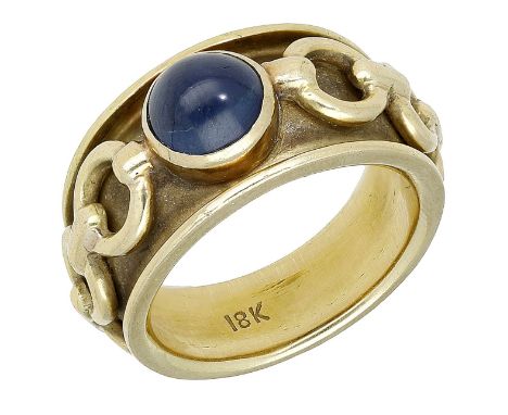 A sapphire ring, the sapphire cabochon collet-set to a tapered band with aplied chain-link decoration, stamped ‘18K’, ring si
