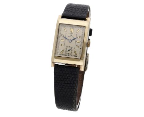 Rolex. A gold rectangular wristwatch, Ref. 2732, circa 1938. Movement: manual winding, 15 jewels. Dial: silvered, gilt baton 