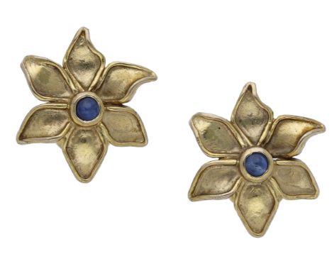 A pair of sapphire earrings by Deakin & Francis, the 9ct gold flowerheads with a circular sapphire cabochon to the centre, Bi