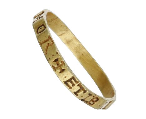 A Medieval gold posy ring, late 12th century, with rectangular section hoop, the exterior engraved with Roman/Lombardic lette
