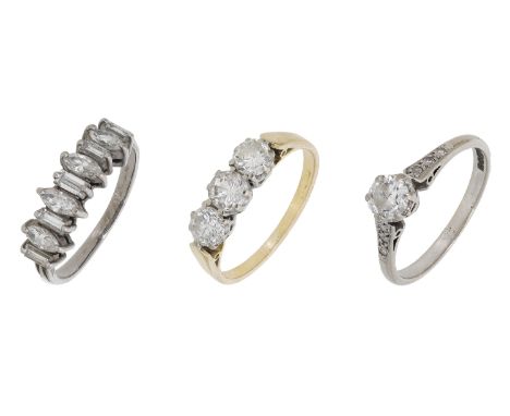 Three diamond rings, comprising a diamond single stone ring, a diamond three stone ring, and a diamond dress ring set with ma
