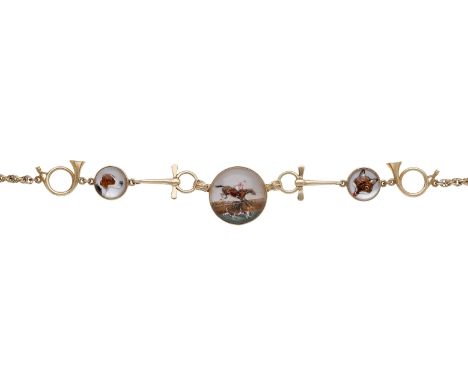 A reverse carved and painted crystal intaglio necklace, the frontispiece designed as alternating snaffle bit and hunting horn