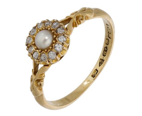 A pearl and diamond cluster ring, 1901, the half-pearl centred within a surround of old single-cut diamonds, to bifurcated sc