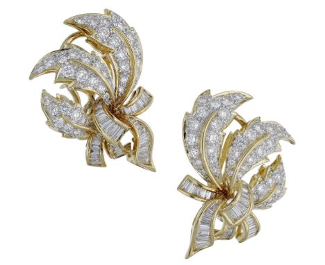 A pair of diamond earrings, of foliate spray design, the brilliant-cut diamond-set leaves with polished midribs and tied by a